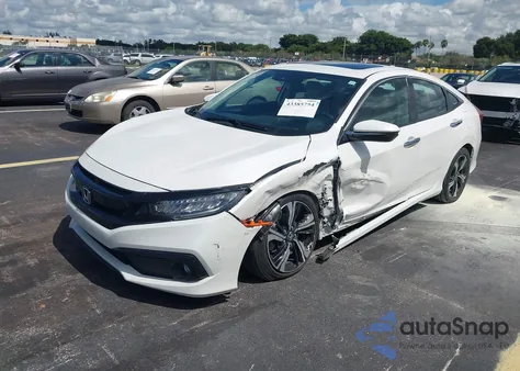 2016 Honda Civic Touring z USA, uszkodzony, nr VIN 19XFC1F92GE034567